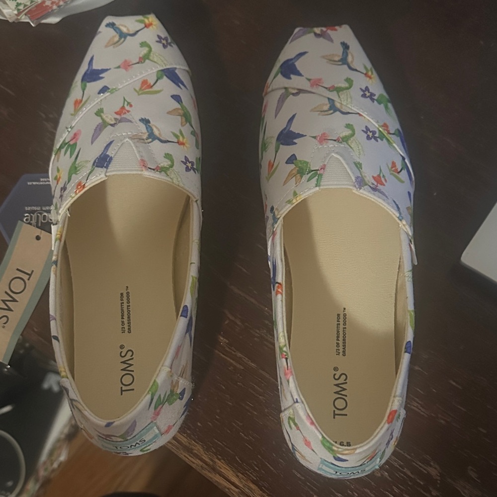 Toms Women's Cream Slip-On Flats with Multicolor Bird Print